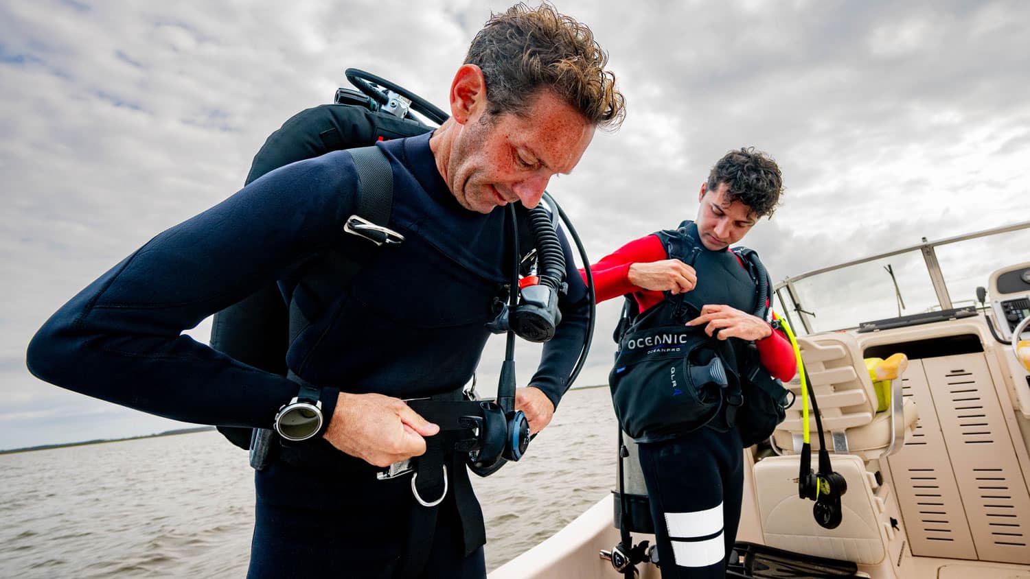 Tal Ben-Horin and his graduate student Zakir Bulmer prepare to scuba dive in the Pamlico Sound.